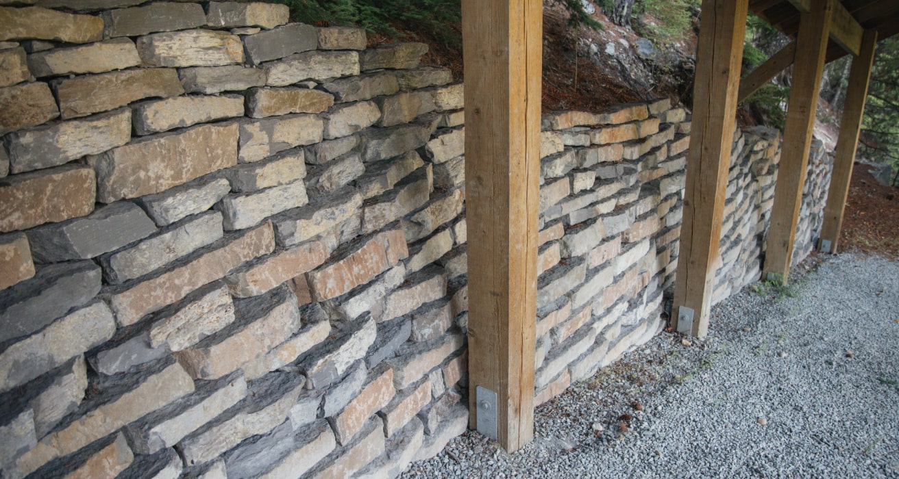 Dry stack stone retaining wall