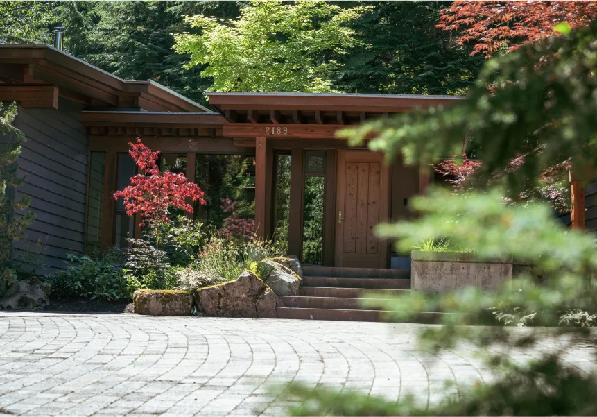 Paver driveway at timber home